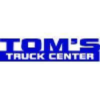 tom's truck center logo image