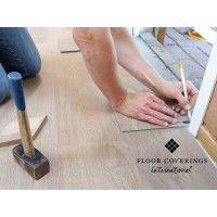 floor coverings international of palm beach logo image