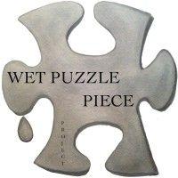 wet puzzle piece productions logo image