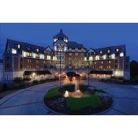 the hotel roanoke & conference center, curio by hilton logo image