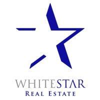 white star real estate (wsre) logo image