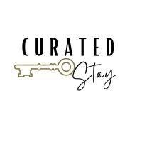 curated stay logo image