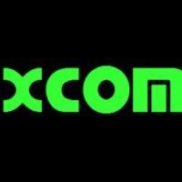 xcom corporation logo image