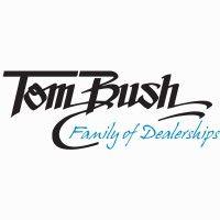 tom bush family of dealerships logo image