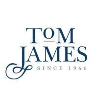 tom james company logo image