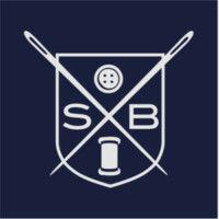 samuel baron clothiers logo image