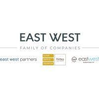 east west family of companies logo image