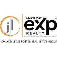 the jon & leslie foster real estate group logo image