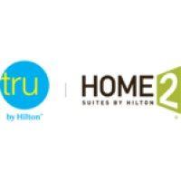 tru/home2 suites by hilton phoenix midtown logo image