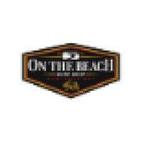 on the beach surf shop logo image