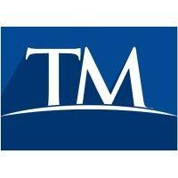 t.m. wealth management logo image