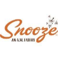 snooze an a.m. eatery logo image