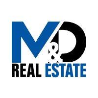 m&d real estate logo image