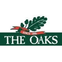 the oaks hotel logo image