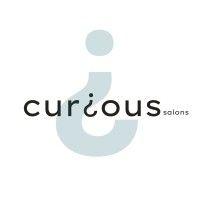 curious salons logo image