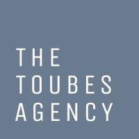 the toubes agency logo image