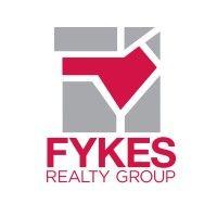 fykes realty group logo image