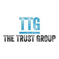 the trust group logo image