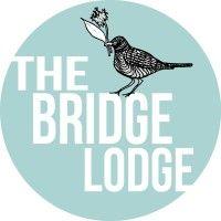 the bridge lodge company. logo image