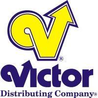 victor distributing company logo image