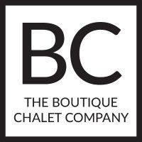 the boutique chalet company logo image