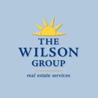 the wilson group real estate services, llc logo image