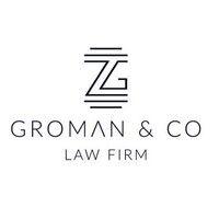 groman & co law firm logo image