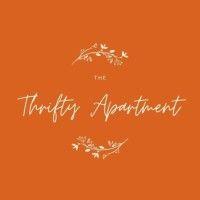 the thrifty apartment logo image