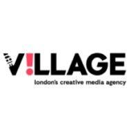 the village  communications logo image