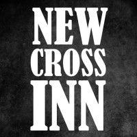 new cross inn logo image