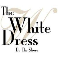 the white dress by the shore logo image