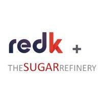 the sugar refinery + redk logo image