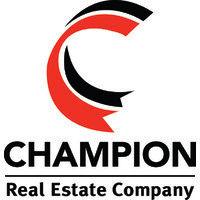 champion real estate company logo image