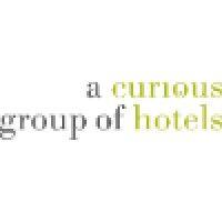 a curious group of hotels logo image