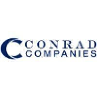 the conrad companies logo image