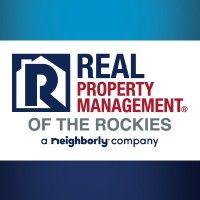 real property management of the rockies logo image