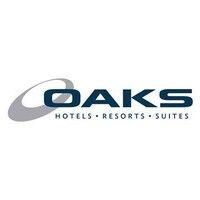 oaks hotels, resorts & suites logo image