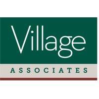 village associates real estate logo image