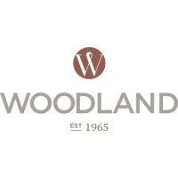 woodland supply & mfg ltd logo image