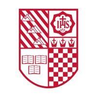 regis jesuit high school logo image