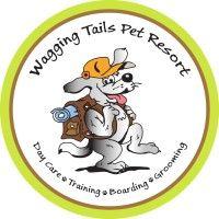 wagging tails pet resort inc. logo image