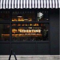 the libertine bar and kitchen logo image