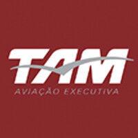 tam aviação executiva logo image