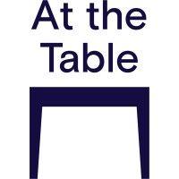 at the table logo image