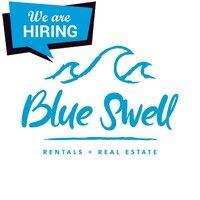 blue swell rentals + real estate logo image