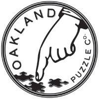 oakland puzzle company logo image