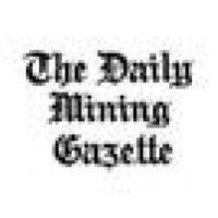 daily mining gazette logo image