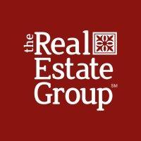 the real estate group llc logo image