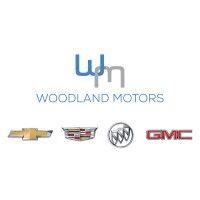 woodland motors logo image