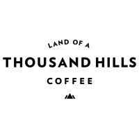 land of a thousand hills coffee logo image